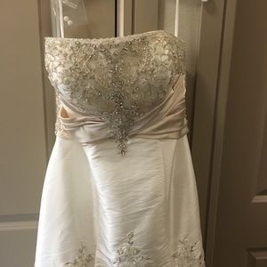 Size 14, BNWT Strapless cream beaded wedding dress